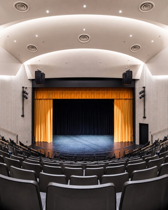 Modern Theater Interior With Golden Curtains