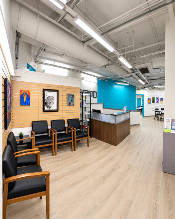 Modern Gallery Reception With Teal Accents