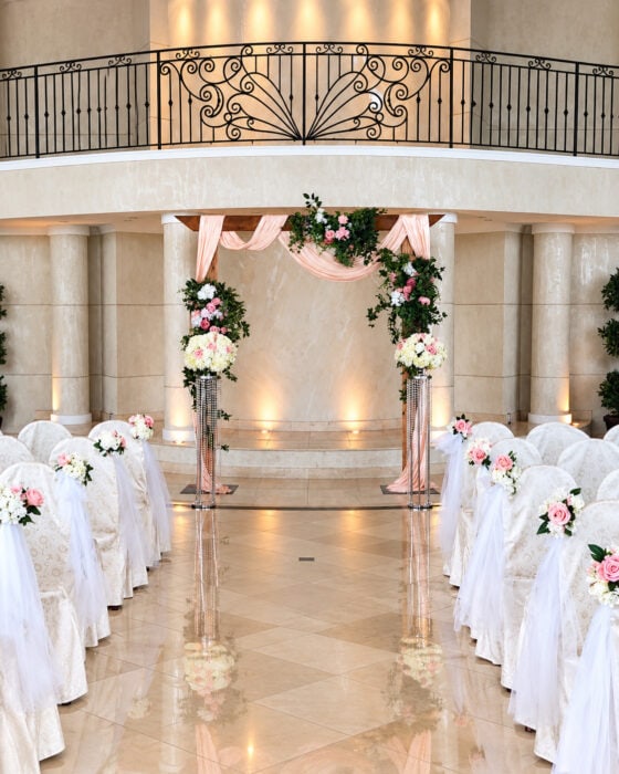 Elegant Blush Wedding Altar In Marble Hall