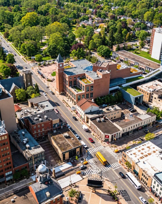 Clock Tower Over The Downtown Intersection